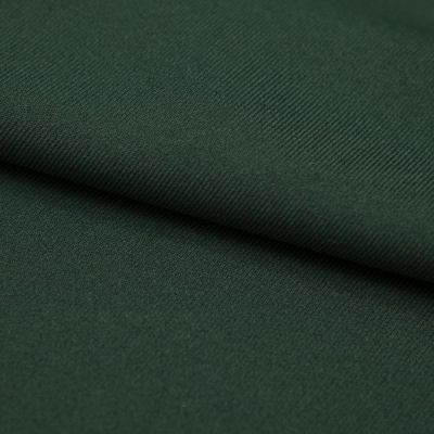 Ткань костюмная 21010 2076, 225 гр/м2, шир.150см, цвет т.зеленый - купить в Набережных Челнах. Цена 390.73 руб.